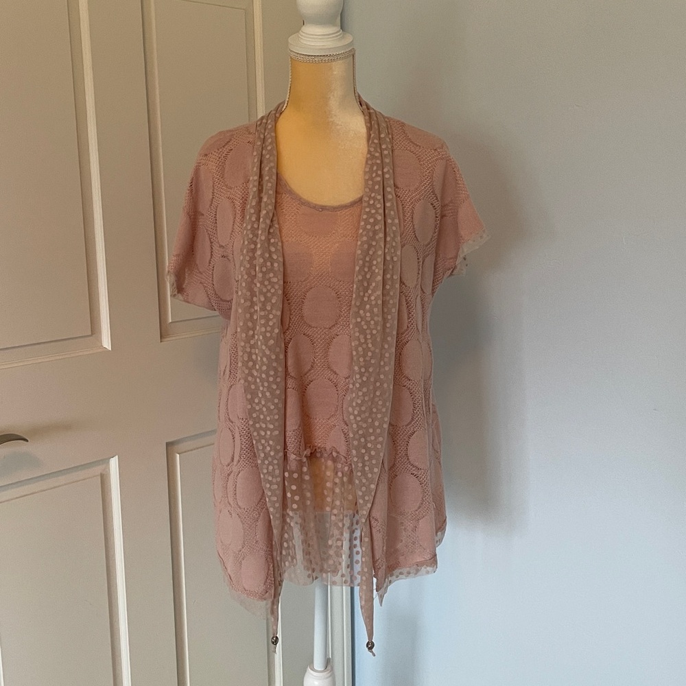 This 2-piece ensemble has sleeveless tank top & matching short sleeve cardigan!